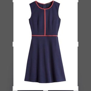 NWT, THML, textured navy dress with coral seam details. Flattering fit, size L.